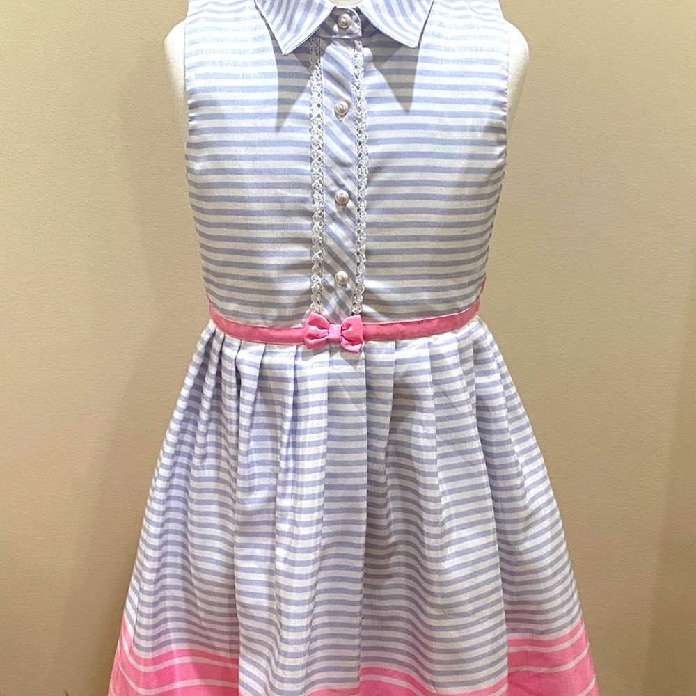 A really cute doll dress, great condition and would be super cute for anything